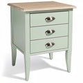 Dressoir met drie lades en houten blad in mintgroen.